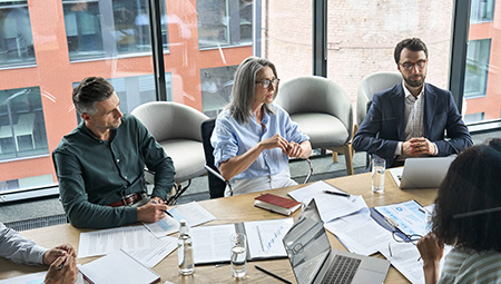 Photo of people at a table.